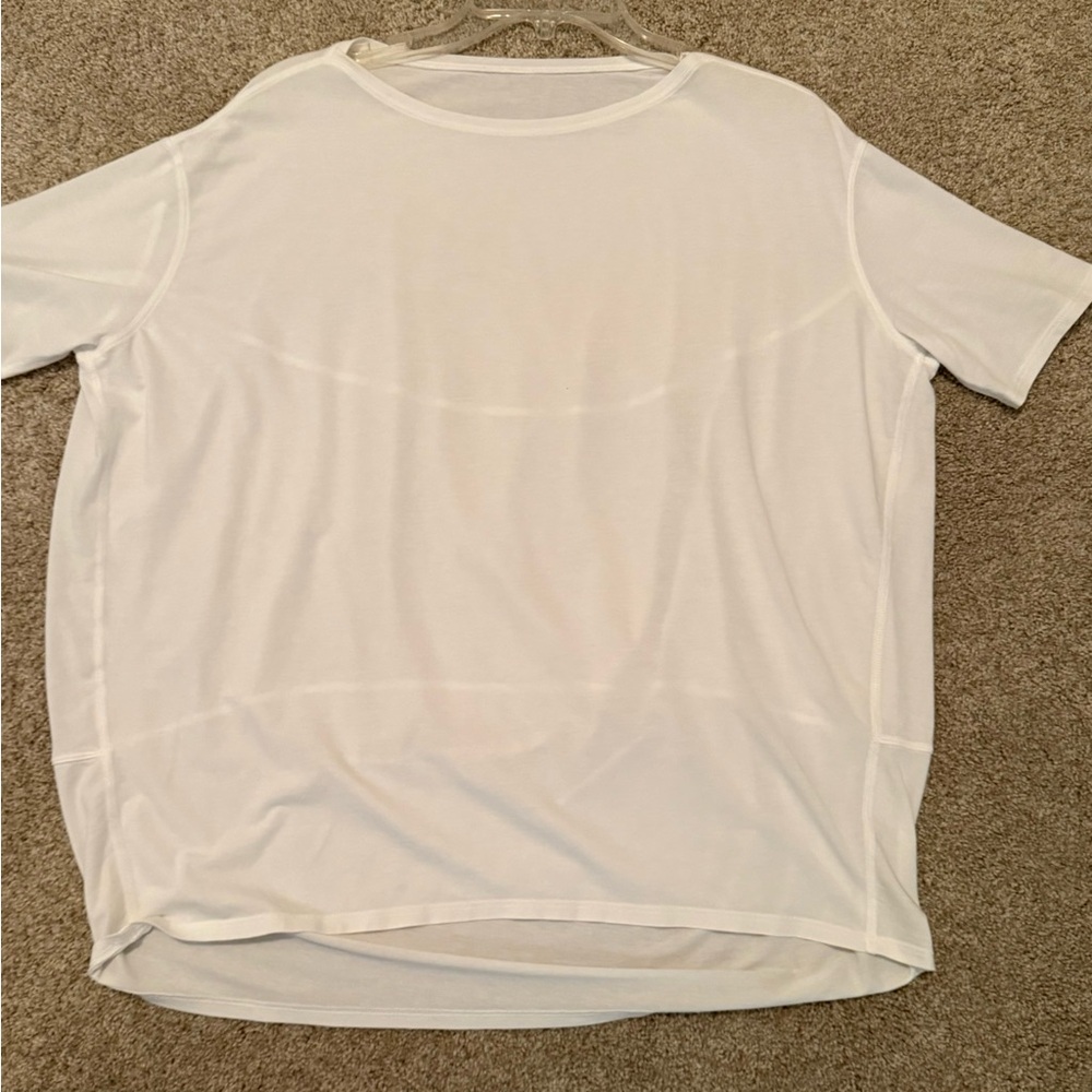 Lululemon white short-sleeve Back in Action top size 8